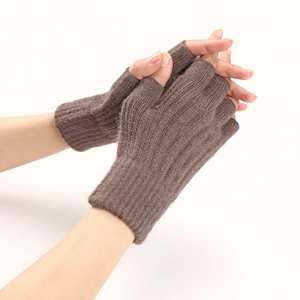 Close-up of brown ribbed knit fingerless gloves showing texture and soft material