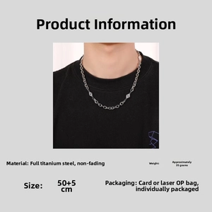 Close-up of titanium steel necklace chain with geometric pendant showing non-fading material