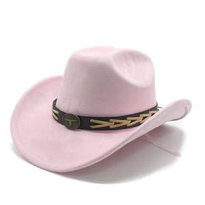 Pink suede cowboy hat detail featuring brown leather band and vintage bull head metal badge