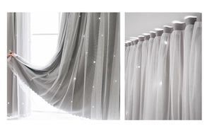 Detail of grey blackout curtain with star cut-outs and white lace sheer fabric