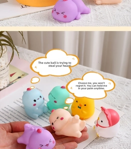 Mini colorful cartoon dinosaur squeaky toys on lace cloth for sensory play