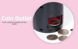 Close-up of the back coin release slot on the black Daruma electric money bank