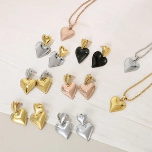 Detailed array of heart necklaces and earrings in gold, silver, rose gold and black finish