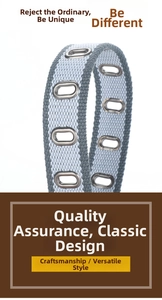 Detail of woven canvas belt showing blue interlaced fibers and silver metal eyelets