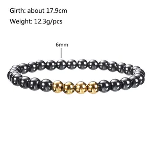 Detail view of 6mm beads elastic bracelet with grey hematite and gold accents