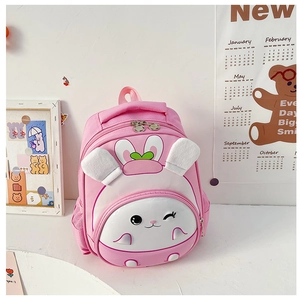 Pink toddler backpack featuring 3D bunny ears and a cute cartoon face on the front pocket