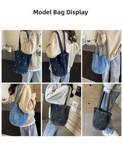 Detailansicht der Denim-Einkaufstasche mit bunter Blumenstickerei in verschiedenen Farben