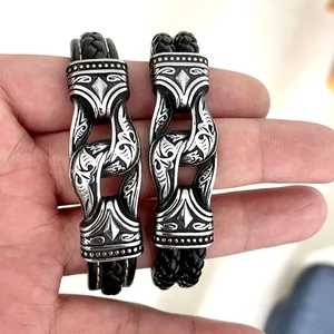 Retro Viking engraved steel bracelets with braided leather bands in vintage silver finish