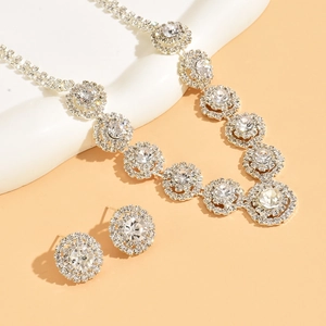 Elegant silver bridal jewelry set with sparkling rhinestones necklace and earrings