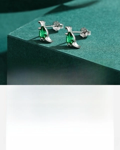 Close-up of S925 silver penguin earrings with hand-set green pear-cut 5A zircons