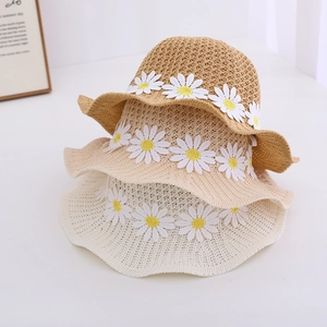Girls daisy straw sun hat with wavy brim in brown and beige for beach vacations