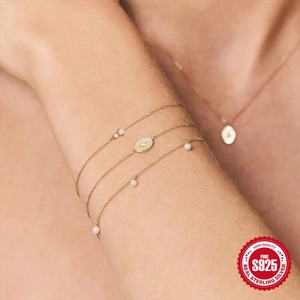 Three-layer S925 sterling silver gold-plated bracelet with pearls and star pendant