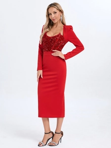 Detail of red sequin patchwork on elegant long sleeve dress with slim fit pencil silhouette