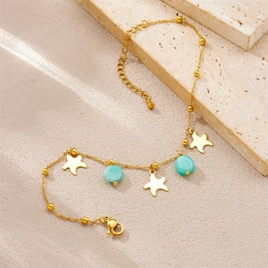 Gold starfish ankle bracelet with mint green stone beads on minimalist chain