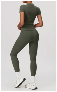 Detail view of the back of high-waist yoga pants with heart-shaped stitching for lifting