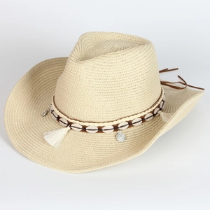 Classic straw cowboy hat with bohemian shell and fringe trim for summer beach travel