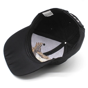 Detail of 100% cotton baseball cap showing internal Eagle embroidery and USA logo