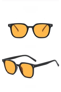 Front and side views of vintage square black sunglasses with transparent orange lenses