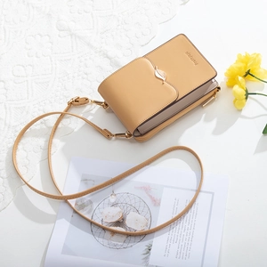 Beige PU leather phone bag with leaf-shaped metal clasp and adjustable slim strap