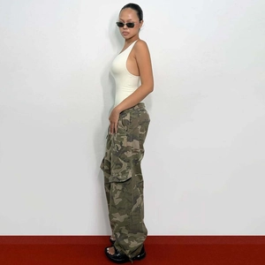 White one-shoulder bodysuit paired with camouflage cargo pants for a chic summer outfit