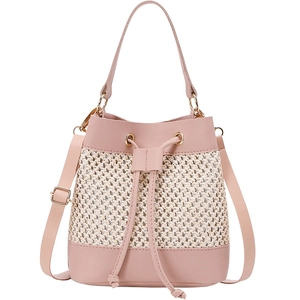 Pink patchwork straw bucket bag with adjustable shoulder strap and drawstring closure