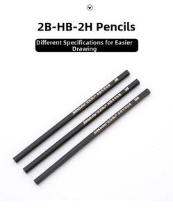 Close-up of 2B, HB, and 2H drafting pencils with matte black hexagonal barrels for engineering