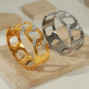 Elegant gold and silver hammered geometric wide link bracelet with sparkling rhinestones