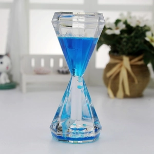 Blue diamond-shaped liquid timer with dolphin ornament for desktop decoration
