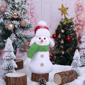 Cute Christmas snowman plush with plaid hat and green scarf for holiday window decor