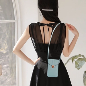 Chic light blue touch-screen crossbody phone bag with gold clasp and slim strap