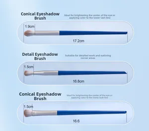 Detailed view of three blue eye makeup brushes with silver ferrules and length dimensions