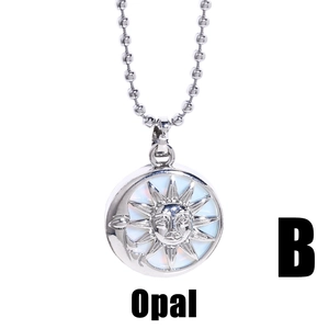 Vintage sun and moon pendant necklace with opal stone and silver bead chain on white base