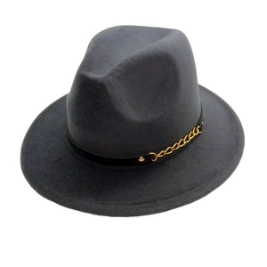 Detail of grey felt fedora featuring black leather band and gold metal chain accent
