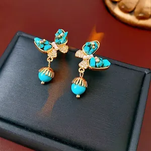 Boucles D Oreilles Papillon Vintage Luxe Turquoise Zircon Künstliche Perle Cuivre Plaqué Or Avec Tige En Argent