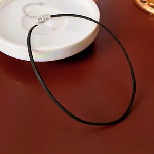 Minimalist black leather choker necklace with silver adjustable chain and clasp