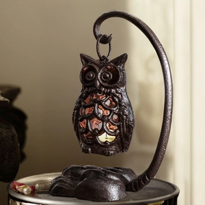 Bougeoir chouette vintage en fonte avec lanterne suspendue et support décoratif en métal