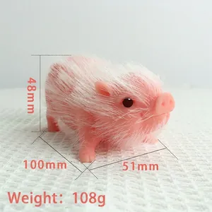 Squeeze sensory stress relief pink silicone pig toy with soft white faux fur, 10cm long