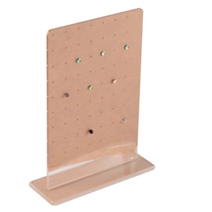 Detail of acrylic earring display stand with wood grain finish and multiple hole patterns