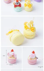 Macro detail of colorful PVC macaron cake charms with dimensions 5cm height and 3.5cm width
