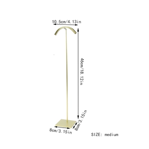 Detailed dimension guide for the medium golden metal handbag and jewelry display stand