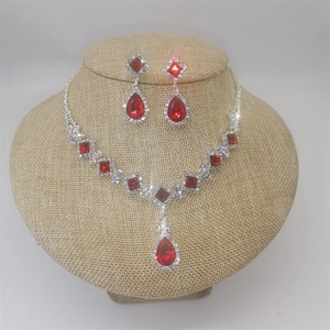 Elegant bridal jewelry set with red teardrop crystal necklace and matching earrings