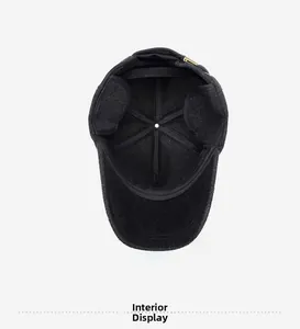 Detailed view of the winter baseball cap interior featuring warm fold-down ear protection