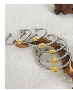 Detailed macro view of twisted cable bracelets with colorful marquise-cut zircon stones