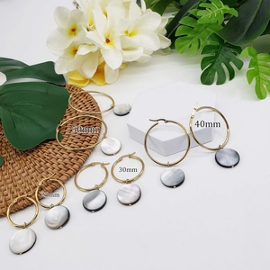 Minimalist stainless steel hoop earrings with natural black shell pendants in four sizes