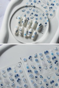 Detailed blue floral nail stickers featuring roses, butterflies and 3D relief textures