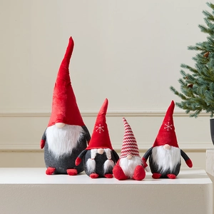 Set of four plush Christmas gnomes with retractable legs in red and grey holiday colors