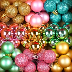 Assorted Christmas ball ornaments in glittery, matte, and glossy finishes for festive decor