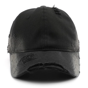 Black distressed baseball cap with ripped holes and stonewashed cotton twill fabric