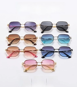 Collection of rimless metal sunglasses in seven gradient colors with irregular cut lenses