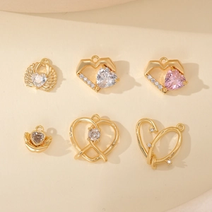 Set of gold heart-shaped pendants with cubic zirconia for DIY jewelry making